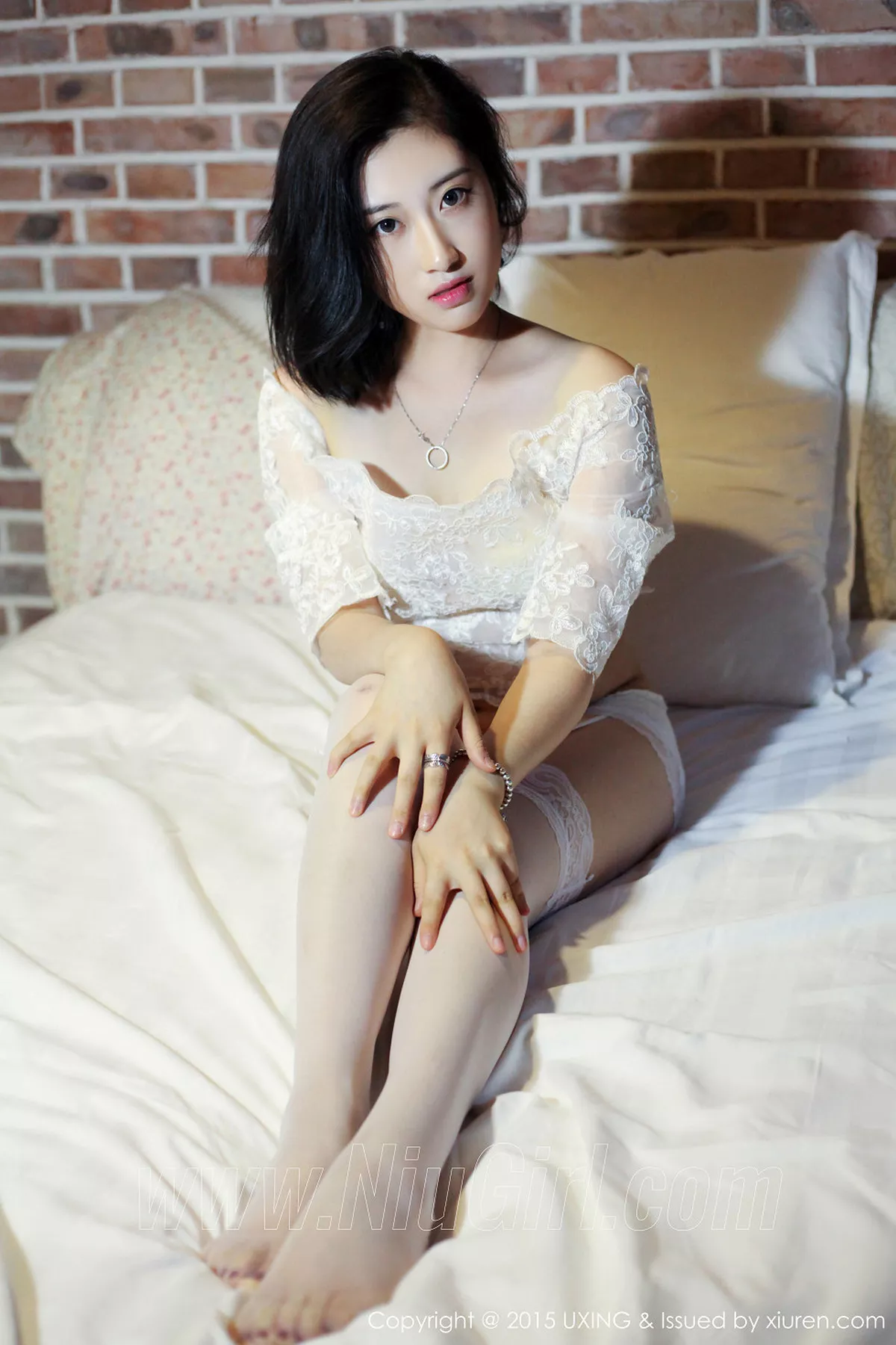 秀人集.com_[UXING优星馆]Vol.014_嫩模Rialer傅雅慧白色蕾丝吊带丝袜性感翘臀写真39P