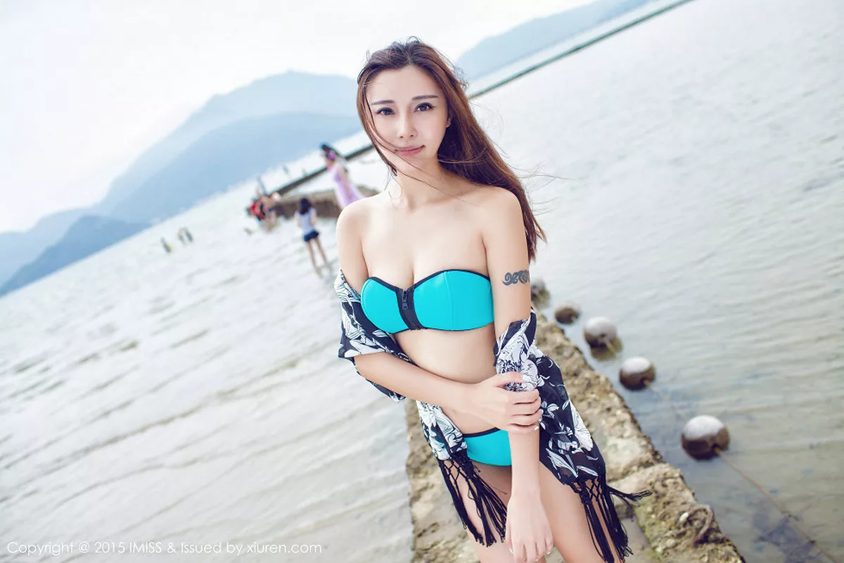 秀人集.com_[IMISS爱蜜社]Vol.014_嫩模乐乐Mango沙滩边比基尼秀豪乳性感写真50P