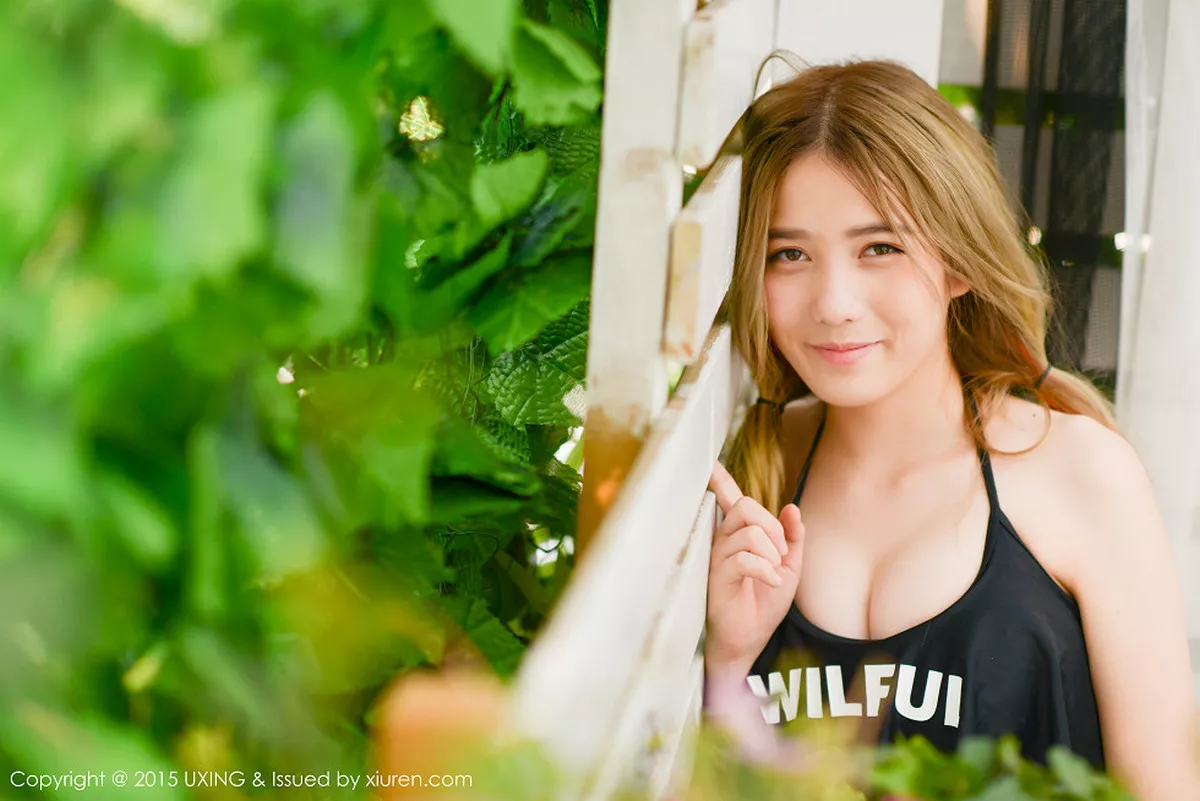 秀人集.com_[UXING优星馆]Vol.026_嫩模懒桃子黑色比基尼秀完美身材性感美胸写真50P