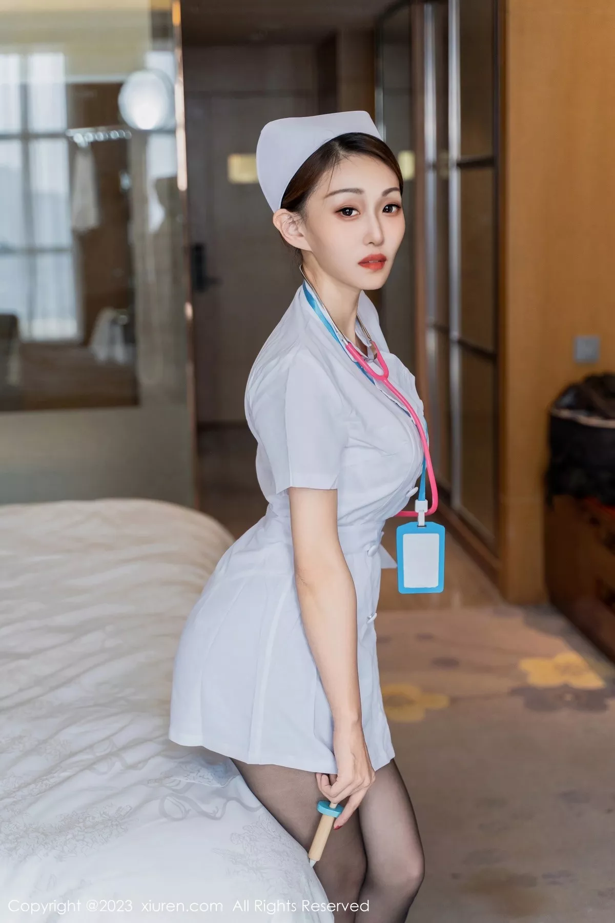 秀人集.com_[XiuRen秀人网]No.6971_模特妖-Baby性感白色护士服饰配超薄黑丝秀完美身材诱惑写真67P