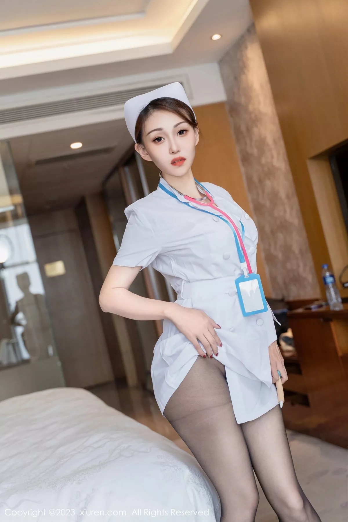 秀人集.com_[XiuRen秀人网]No.6971_模特妖-Baby性感白色护士服饰配超薄黑丝秀完美身材诱惑写真67P